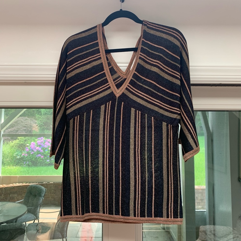 Black and gold detailed top.